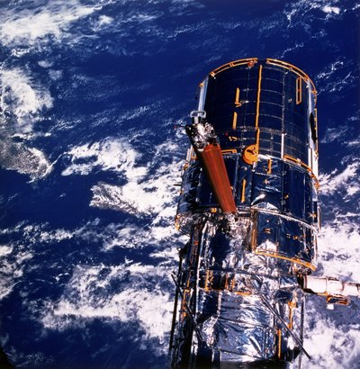 Hubble Space Telescope above the Earth by National Aeronautics and Space Administration National Aeronautics and Space Administration